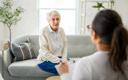 old woman thinking with psychologist in consultation office for mind, evaluation or assessment.