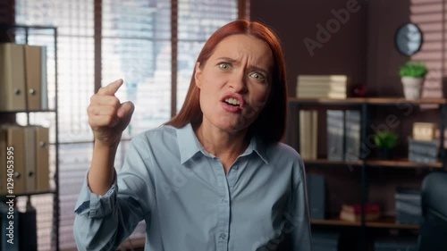 Portrait Caucasian girl angry furious rage mad aggressive business woman female worker businesswoman employer boss in office looking at camera yelling conflict scold argument anger talking screaming