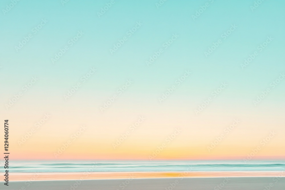 Fototapeta premium glowing horizon with golden hues blending into soft blue sky during serene beach sunrise