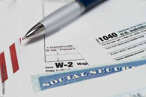 1040 form. and W2 Internal Revenue Service tax forms. Selective focus.
