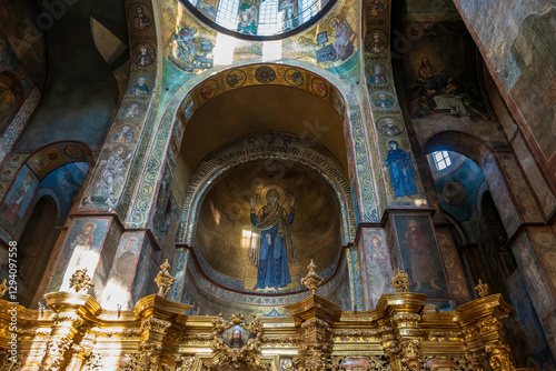 Interior of the famous St. Sophia Cathedral with mosaic Orans of Kyiv, frescoes on the wall and the golden altar. Kyiv, Ukraine, February 24, 2025