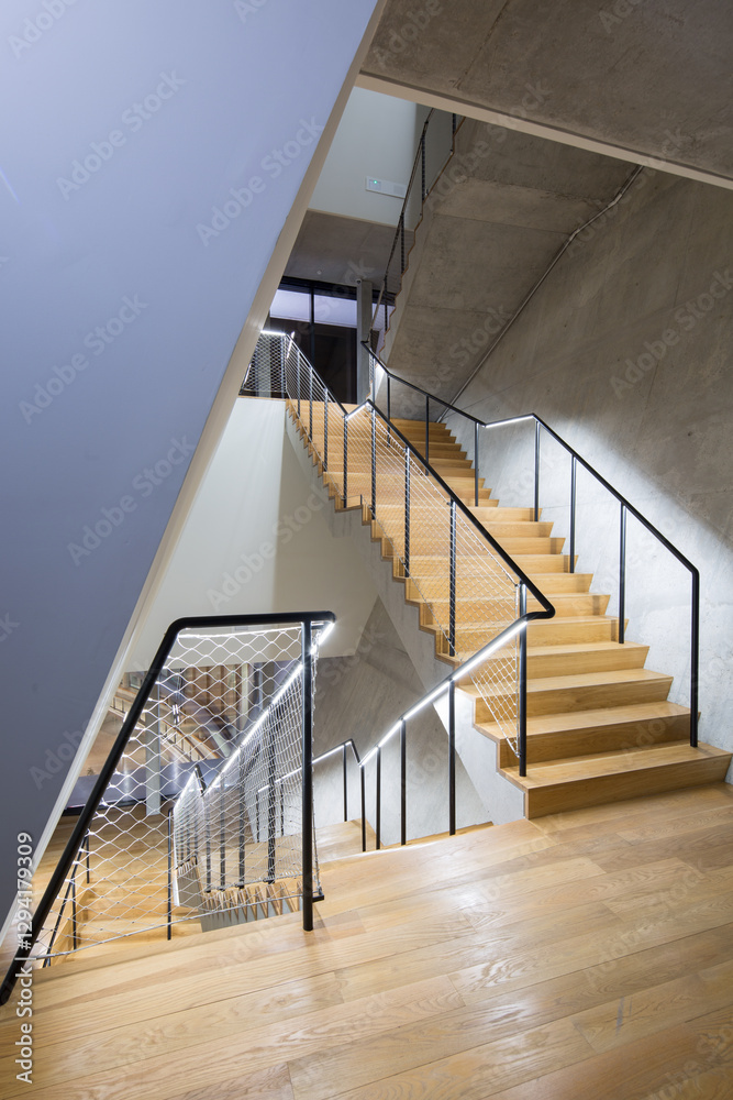 Spiral Concrete Staircase with Wooden Handrail Spiral Concrete Staircase with Wooden Handrail