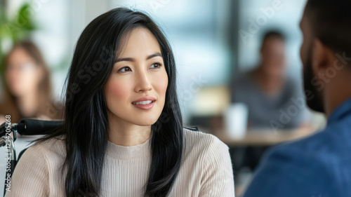 Wallpaper Mural Friendly Conversation Between Colleagues in a Modern Office Setting Torontodigital.ca