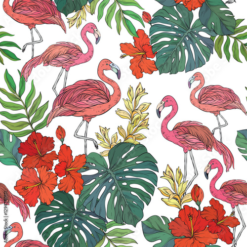Vibrant colorful seamless vector tropical pattern with flamingo and palm leaves and flowers on pink background.