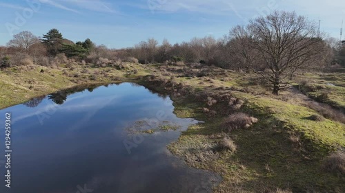 wet dunes during winter in the netherlands drone flight