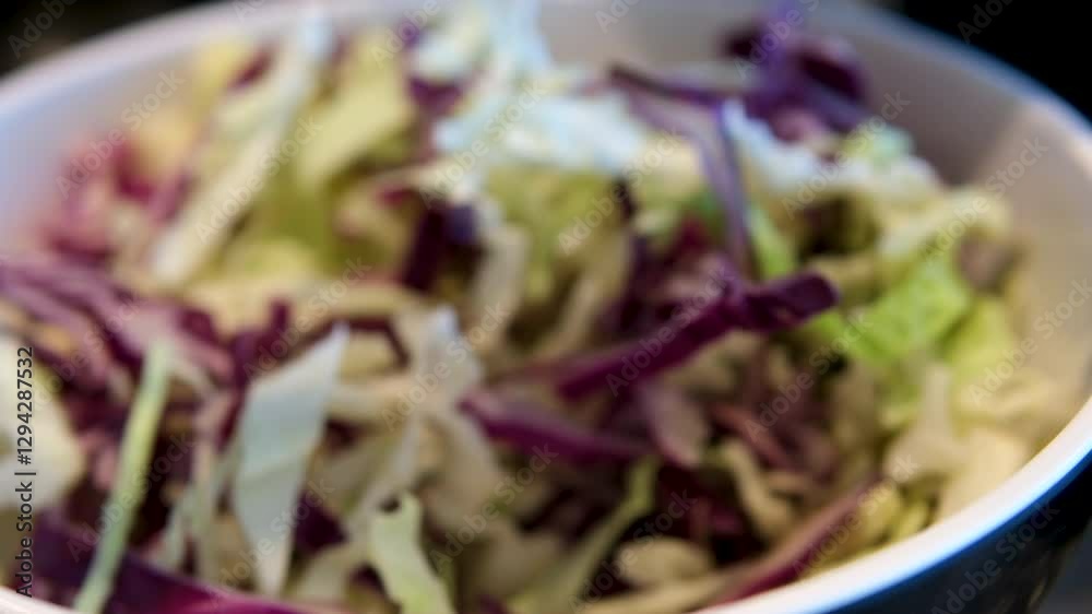 cooking and home concept close of male hands mixing salad in a bowl. High quality 4k footage cooking and home concept close of male hands mixing salad in a bowl. High quality 4k footage
