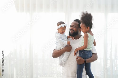 cheerful african single dad playing with kids indoors at home