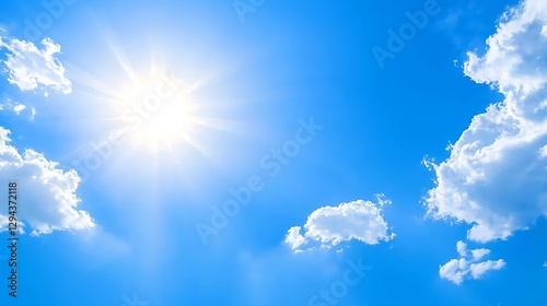 A bright, sunlit sky with no clouds, showcasing the full power of the sun shining through the clear, blue expanse.