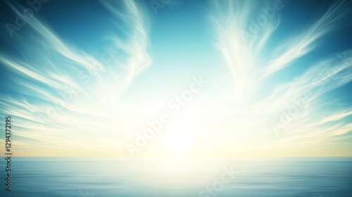 Fototapeta Naklejka Na Ścianę i Meble -  A bright, sunny sky with soft, wispy clouds drifting lazily in the clear blue sky.