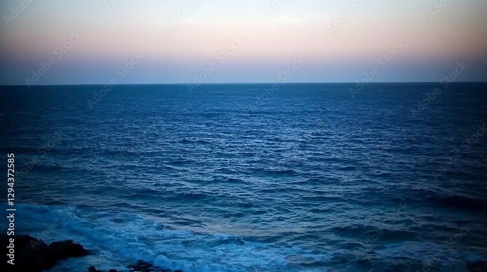 Fototapeta premium A calm evening sky with a smooth gradient from soft pink to deep blue, creating a serene and beautiful end to the day.