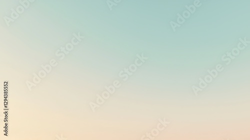 A serene evening sky with a smooth gradient of pink fading into deep blue, capturing the beauty of twilight.