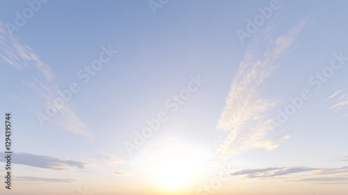 The bright, midday sky with gentle cloud formations and a soft, light blue background, creating a soothing atmosphere.
