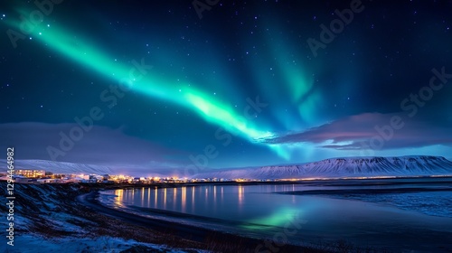 The northern lights lighting up the night sky over Reykjavik, Iceland.
