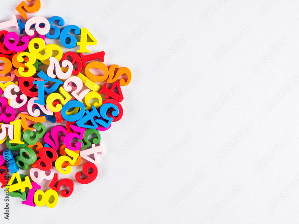 Fototapeta premium Bright numbers on a white background, giving the image a modern and dynamic look, ideal for educational projects.