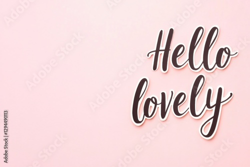 Warm greeting card with the words hello and lovely written in elegant script against a soft pink background