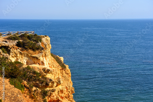 walking path with breathtaking views through the coast from porches to benagil caves lagoa algarve portugal