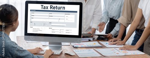 Online tax return form for submitting individual income tax return form brisk on the internet website. Government web for tax payment and return. Taxation technology concept. photo