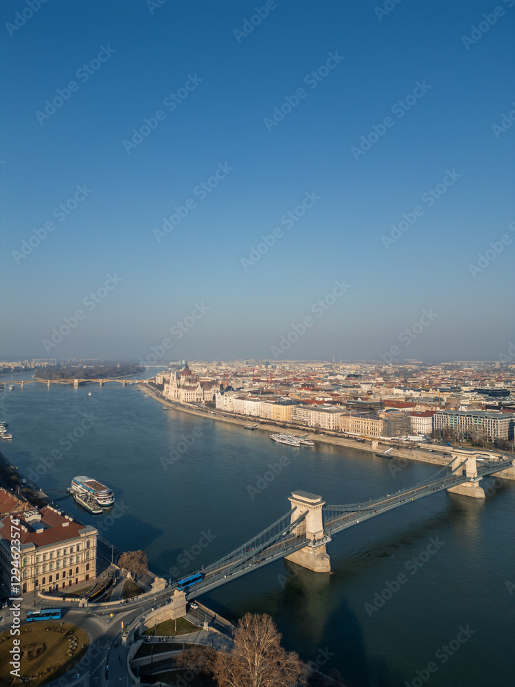 Fototapeta premium Chain Bridge and Hungarian Parliament Building connecting Buda and Pest across Danube river Bu