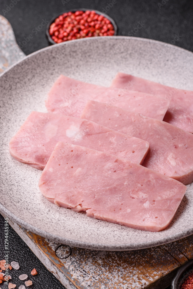 Delicious canned pink ham with salt, spices and herbs Delicious canned pink ham with salt, spices and herbs