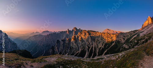 Obraz na płótnie Cadini di Misurina view during sunrise with golden hour warm light panorama w salonie