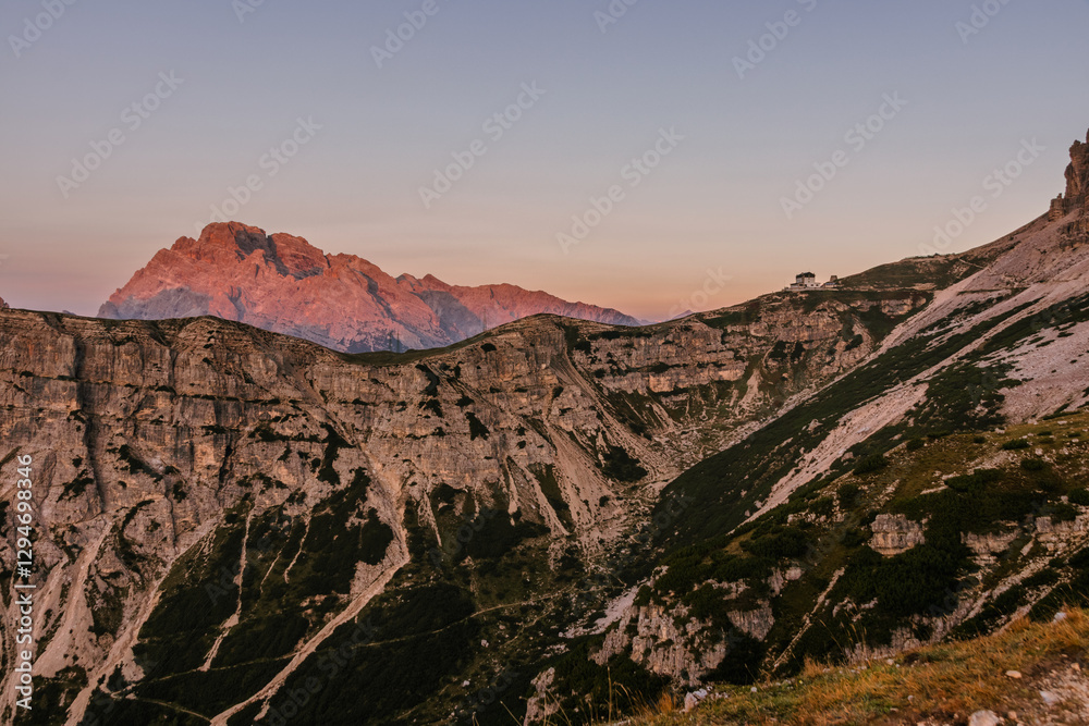 Cadini di Misurina view during sunrise with golden hour warm light
