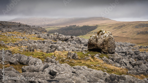 Erratics and the Cheese Press Stone above Kingsdale near Ingleton in the Yorkshire Dales photo