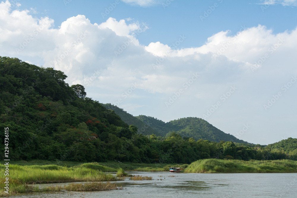 Laos ship cruising along the Mekong River in Luang Prabang Laos ship cruising along the Mekong River in Luang Prabang