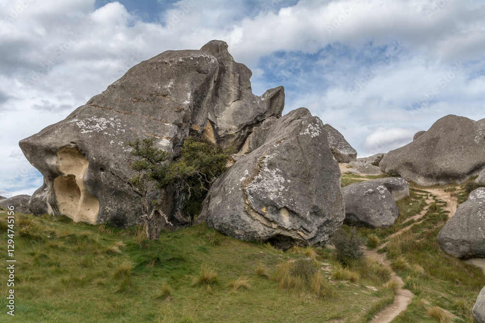 clouds and landscapes at rock formation of Kura Tawhiti clouds and landscapes at rock formation of Kura Tawhiti