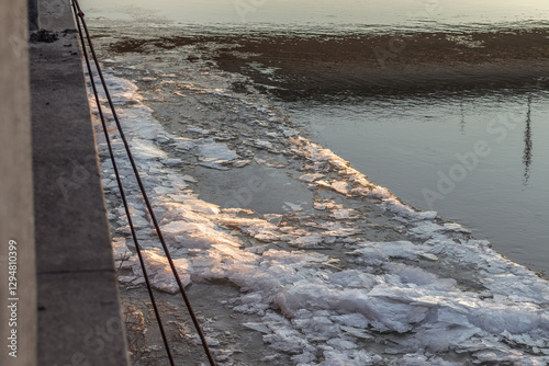 Water with chunks of ice floating in it photo