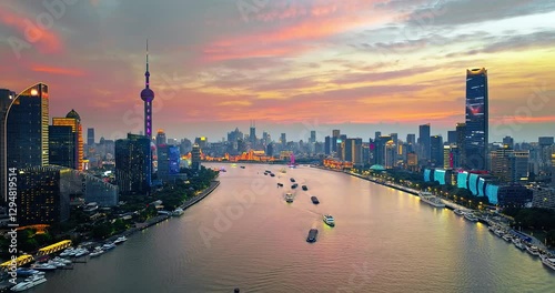 Aerial view of Shanghai skyline and Huangpu River at colorful sunrise