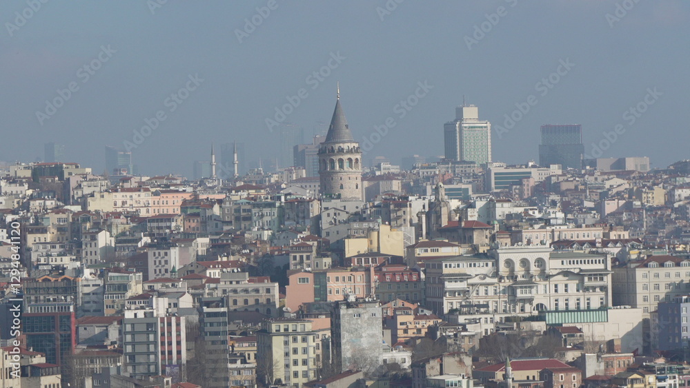 Obraz premium Istanbul Skyline Galata Tower cityscape panoramic view: historical district, modern buildings, hazy day.