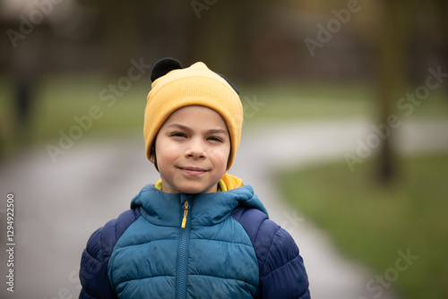 Obraz na płótnie Portrait of little adorable boy walking in park w salonie
