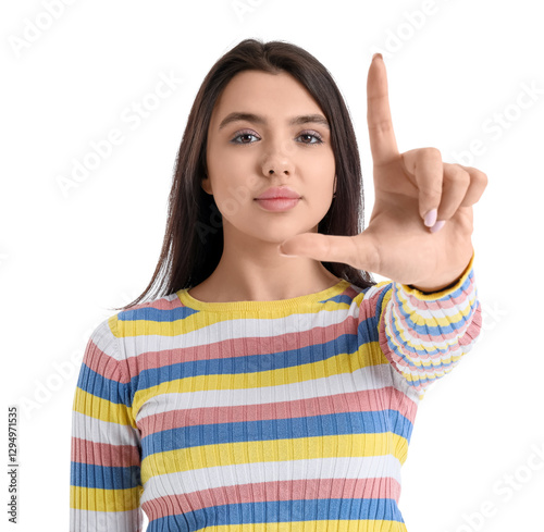 Young woman showing loser gesture on white background, closeup
