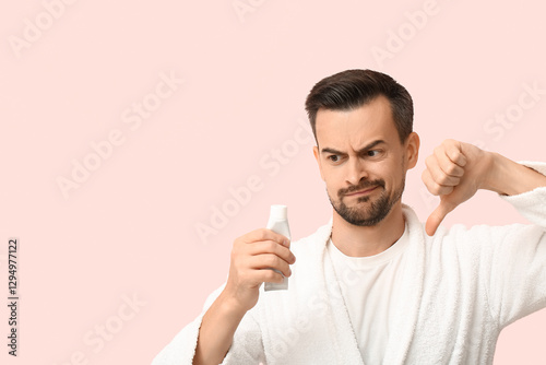 Displeased young man with t...