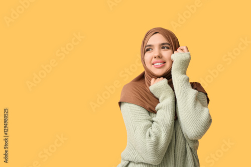 Happy young Muslim woman in...