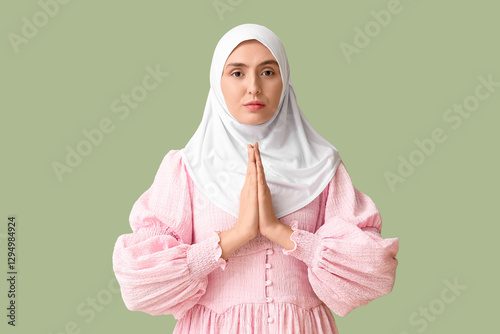 Young muslim woman in white...