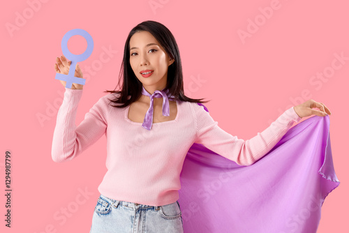 Young Asian woman dressed a...