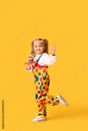 Smiling little girl in clow...