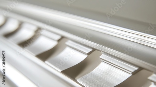 Close-up of elegant white crown molding detail. photo