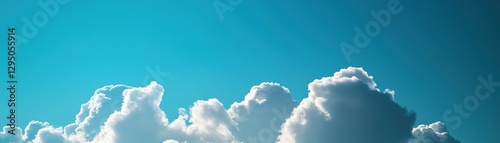 A sleek airplane soars gracefully through the bright blue sky, surrounded by fluffy white clouds. photo