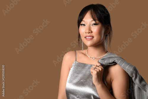 Beautiful Asian woman in si...