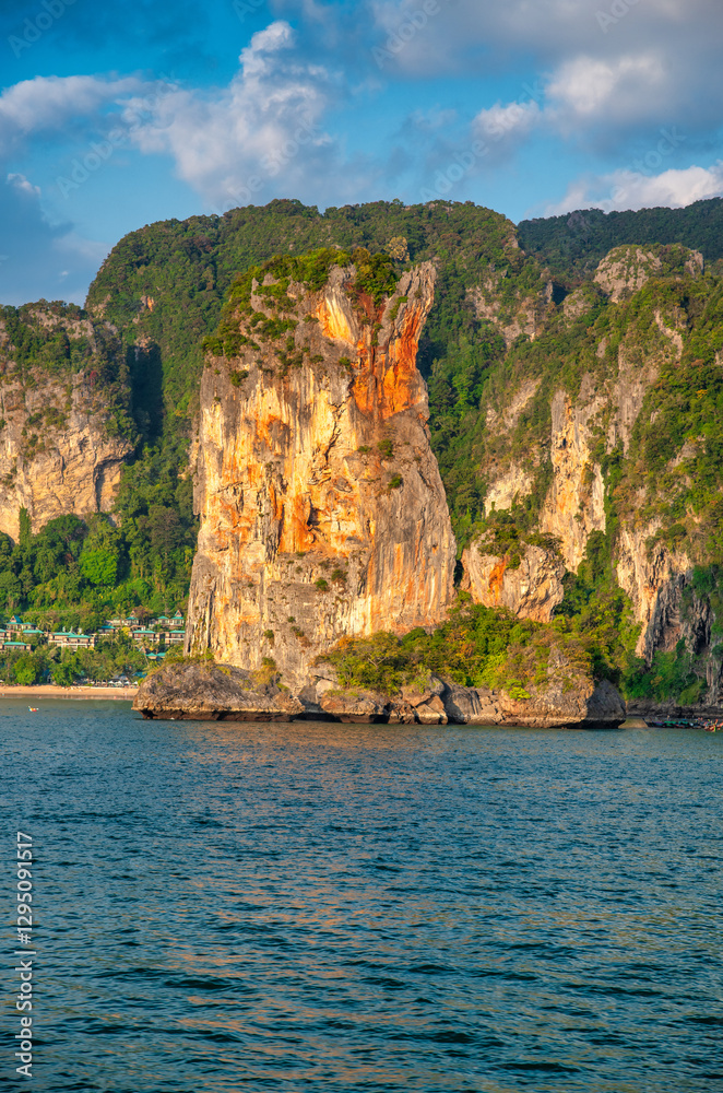 Tropical paradise of Railay Beach in Phuket with limestone cliffs and crystal waters