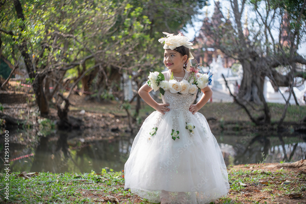 Adorable cute little baby girl wearing vintage clothes in a beautiful place.