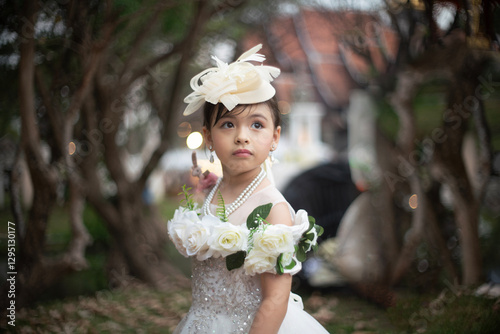 Obraz na płótnie Adorable cute little baby girl wearing vintage clothes in a beautiful place. w salonie