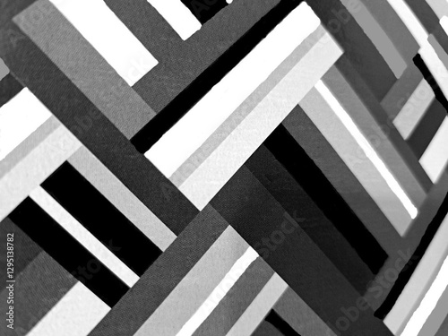 gray, white, and black parallel lines weaving through and going in various diagonal directions