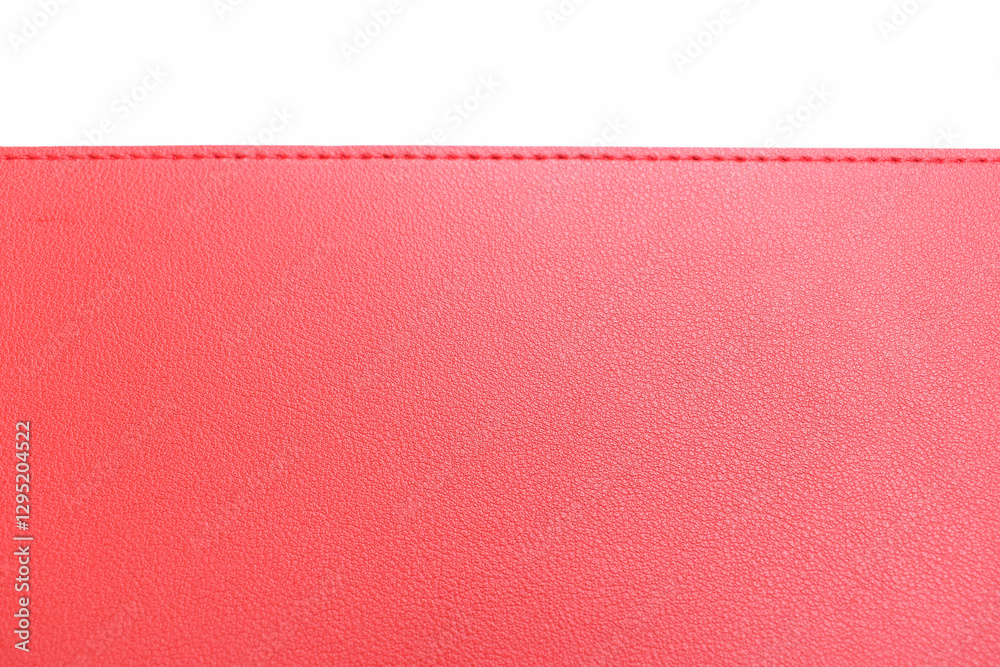 Fototapeta premium shiny red leather texture isolated on white background