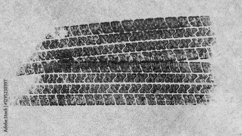 Obraz na płótnie Top view tire marks on the asphalt road, Abstract texture and background black tire tracks on asphalt road, Tire marks on race track texture and background, Vehicle trace on road tire print transport. w salonie