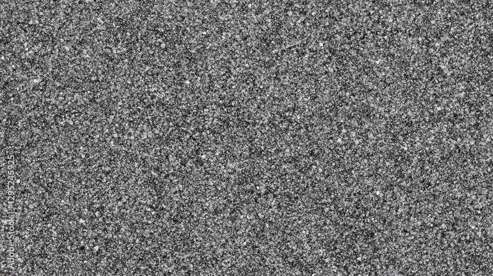 High-resolution image of dark gray gravel. Ideal for backgrounds, textures, or website design elements needing a rough, granular aesthetic. High-resolution image of dark gray gravel. Ideal for backgrounds, textures, or website design elements needing a rough, granular aesthetic.