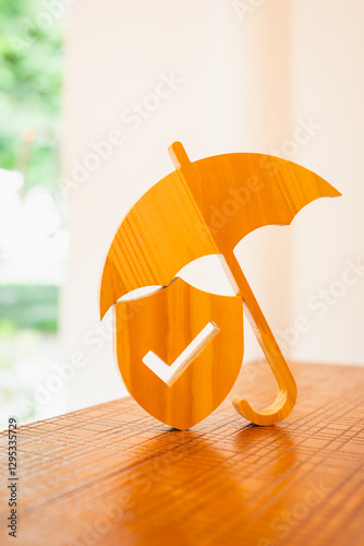 Umbrella and Shield protect, Security protection and health insurance. The concept of family home, protection, health care day, car insurance and home.