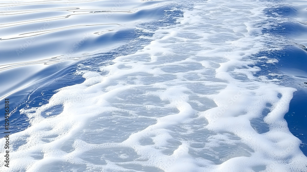 Stunning close-up of white foamy wake trailing behind a boat on a deep blue sea. Perfect for travel, nature, or nautical themes. Stunning close-up of white foamy wake trailing behind a boat on a deep blue sea. Perfect for travel, nature, or nautical themes.